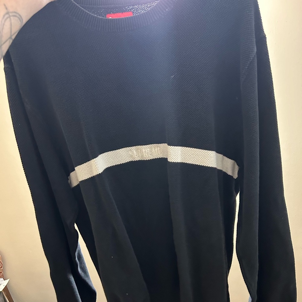 Supreme sweater in a size XL.